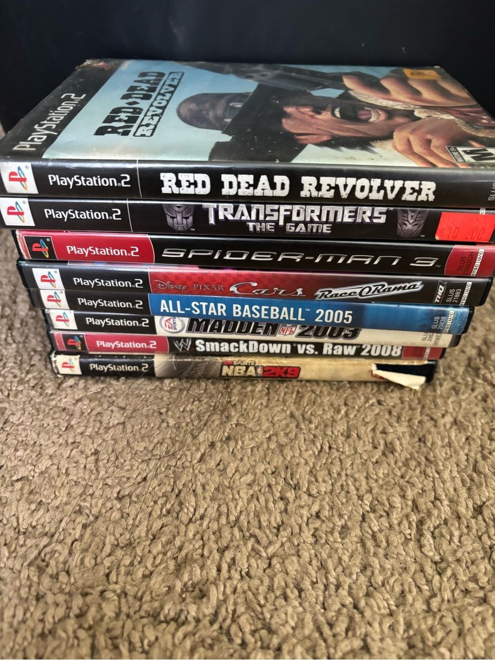 Sony PlayStation 2 Game Bundle with Red, Black, Blue Spines